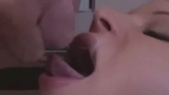 Attractive Redhead Stroking And Sucking A Huge Dick